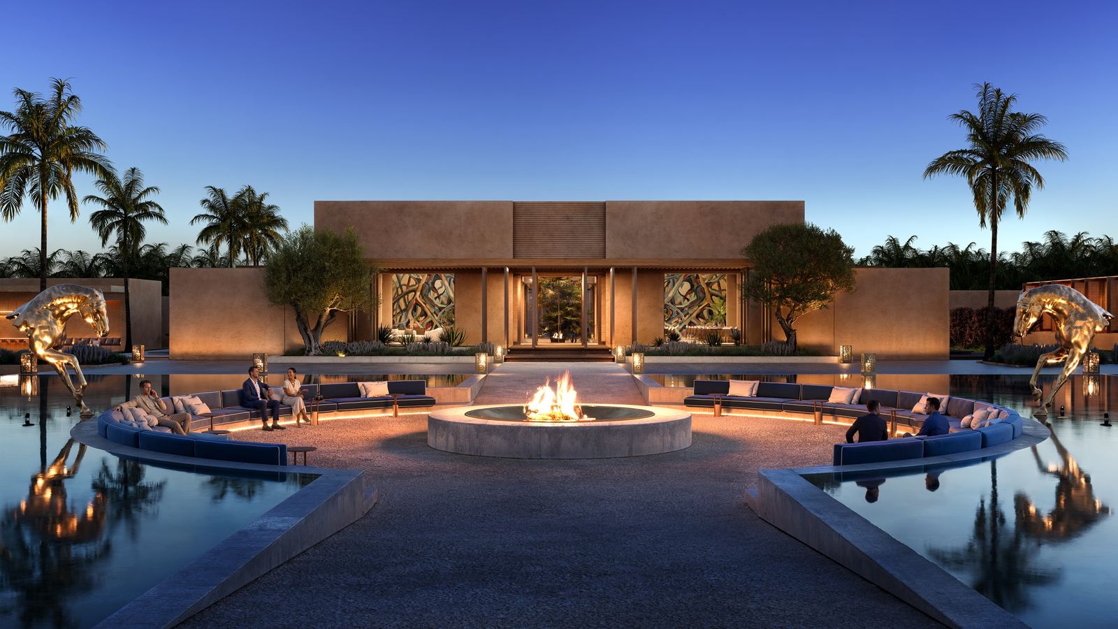 Fire pit courtyard of Farm A at dusk, symmetrical pavilions around the water